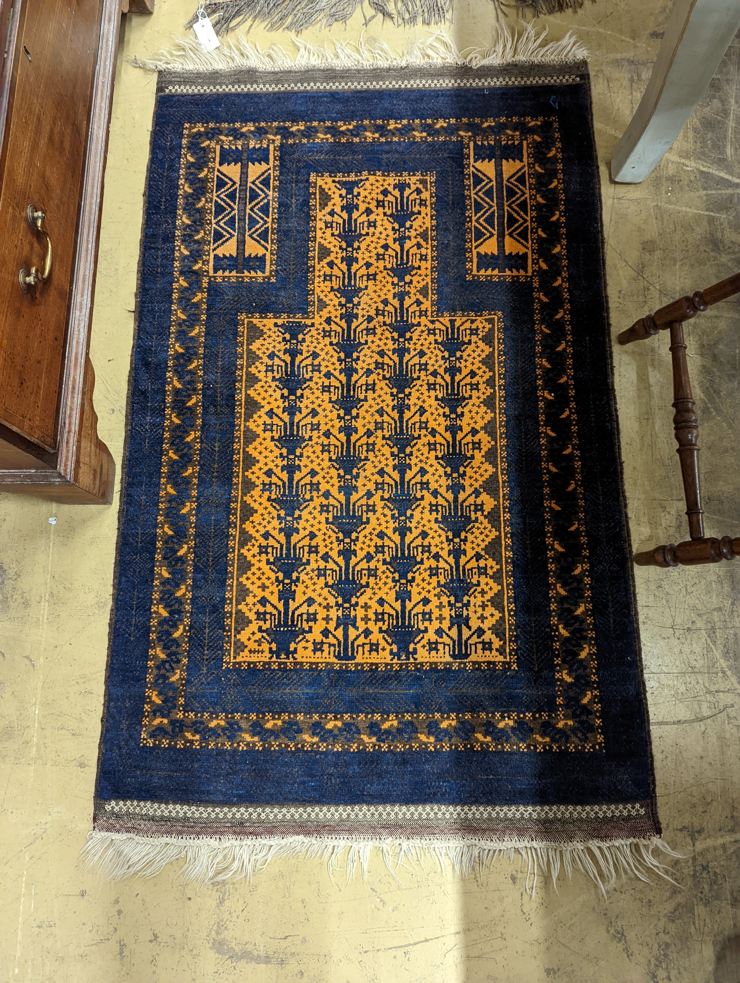 Two Belouch geometric prayer rugs, 106 x 57cm